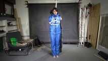 Myxxxy bound and gagged in a shiny nylon Skisuit