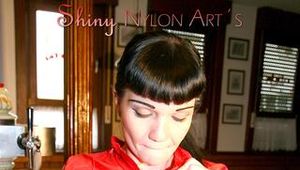 Jill posing sexy in an bar wearing sexy red shiny nylon rainwear (Pics)