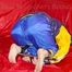 Sonja tied, gagged on a bar and hooded on a sofa wearing a sexy rainwear and downwear combination (Pics)