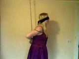 Miri is cuffed up and blindfolded