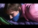 03:50 Min. video with Julia tied and gagged in a shiny pink skisuit