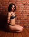 Barefoot Gwen in bra and panties, hogtied on the floor