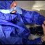 Sonja taking a bath and ties and gagges herself wearing a shiny nylon rainwear combination (Video)