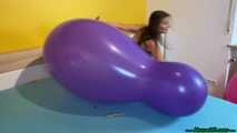 bouncing and popping huge balloons