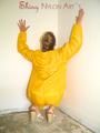 Leonie wearing a super sexy yellow rainwear combination posing outdoor (Pics)