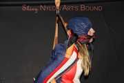 Watching sexy Sandra wearing a sexy oldschool downbib and a down jacket being suspended, tied, gagged and hooded with ropes and a ballgag (Pics)