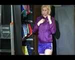 Pia trying on several shiny nylon shorts and rain jackets (Video)