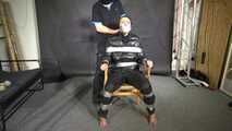 Alice taped to a Chair and tapegagged in shiny nylon Downjacket
