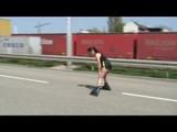 Stella during inline skating wearing shiny nylon shorts and rain jacket (Video)