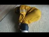 03:20 Min. video with Katharina bound in a yellow rainsuit
