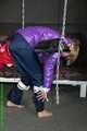 Watch Sonja beeing bound and gagged in her shiny nylon Downwear