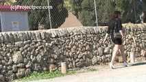 030070 Salma Has A Pee By The Car Park Wall