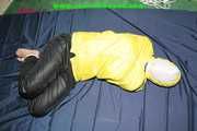 Get 548 Pictures with Jill tied and gagged in shiny nylon rainwear from 2005-2008!