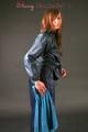 Alina posing in a studio wearing a supersexy darkblue rainwear combination (Pics)