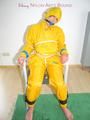 Katharina tied, gagged and hooded on a chair wearing sexy yellow rainwear (Pics)