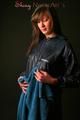 Alina posing in a studio wearing a supersexy darkblue rainwear combination (Pics)