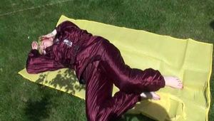 SEXY MARA wearing a special shiny down suit sun bathing and swimming in the pool (Video)