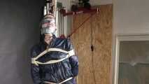 Rachel Adams bound and pantygagged in shiny nylon Rainwear