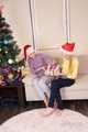 Merida and Hannah - Merida overpowered and hogtied by Hannah under the Christmas tree