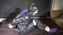 Ronja being tied and gagged with ropes and a ballgag in shiny nylon rainwear and downwear (Video)