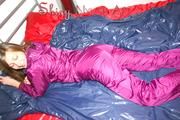 Alina preparing her bed for relaxing and lolling on the bed wearing a sexy shiny nylon rain pants and a rain jacket (Pics)