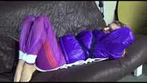 ***HOT SANDRA*** tied, gagged and hooded with ropes and a cloth gag on bed wearing a sexy purple shiny nylon down jacket and a rain pant (Video)