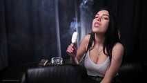 Lera is smoking and eating an ice cream