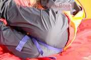 *** HOT HOT HOT*** NEW MODELL*** DESTINY wearing a sexy blue/red shiny nylon rain suit and a life jacket ties and gagges herself with cuffs on a sofa (Pics)