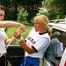An archive girl tied, gagged and kidnaped by another archive girl by car wearing shiny nylon shorts (Pics)