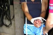 Katharina tied and gagged in shiny nylon shorts