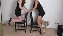 Josefine & Emilia roped to chair 1/2