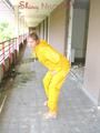 Leonie wearing a super sexy yellow rainwear combination posing outdoor (Pics)