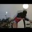 Alina sitting in front of the PC, on a sofa and ind the kitchen wearing different kind of sexy shiny nylon shorts and rain jackets (Video)