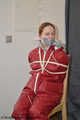 Lady Nadja hard bound and multiple gagged in AGU rainwear