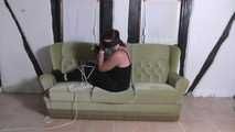 Aurora roped on couch 2/2