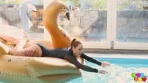 666 Foxy Sanie has fun in the swimming pool.