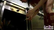 Latex Slut is stuffed in the kitchen