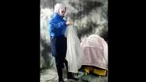Nadja posing in layers of raingear part 2