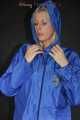 Watching Pia enjoying several shiny nylon rain jackets wearing a sexy shiny nylon rain bib overal (Pics)