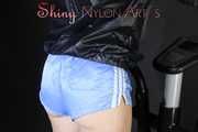 Watching sexy Sonja during her workout wearing sexy blue shiny nylon shorts and a darkblue rain jacket (Pics)