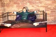 Mara tied and gagged on a princess bed in an old cellar wearing an supersexy shiny green down jacket and a rain pants (Pics)