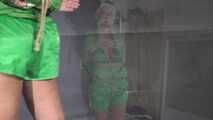 Alice bound and gagged in shiny nylon Shorts and Rainjacket