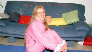 Katharina tied and gagged in shiny nylon ski suit