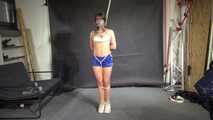 Watch Marie bound and gagged in a shiny nylon Shorts