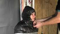 Alice taped to a Chair and tapegagged in shiny nylon Downjacket