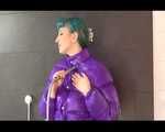 Get an Archive Video with Mara enjoying a shower with her shiny nylon downjacket