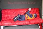 *** HOT HOT HOT*** NEW MODELL*** DESTINY wearing a sexy blue/red shiny nylon rain suit and a life jacket ties and gagges herself with cuffs on a sofa (Pics)