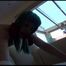 Mara tied and gagged bending over an sofa wearing a yellow shiny nylon shorts and a retro top (Video)