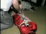 TINY TINA IS HOG-TIED, WRAP TAPE GAGGED & TIED WITH ROPE & ELECTRICAL TAPE (D37-15)