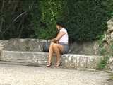 016119 Eve Pees Seated On The Wall Of A Water Channel